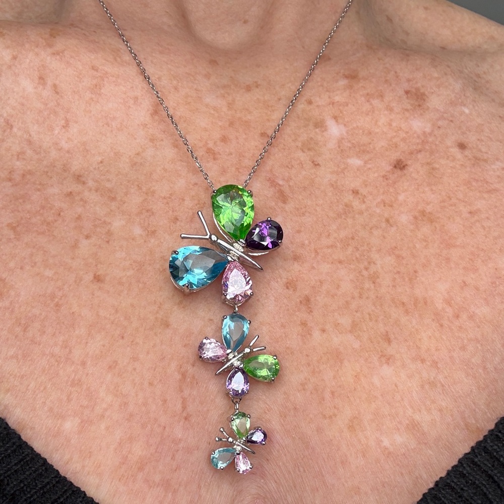 Sterling Silver Butterfly Necklace. 
Pink, Purple, Blue and Green Stones.